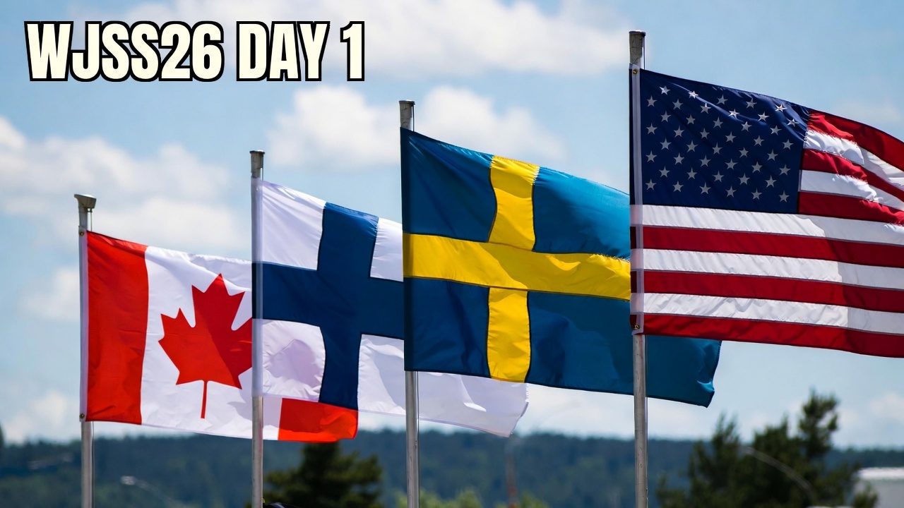The flags of Canada, Finland, Sweden, and the United States flying together outdoors, with a 'WJSS26 Day 1' label, representing the four nations at the World Junior Summer Showcase.